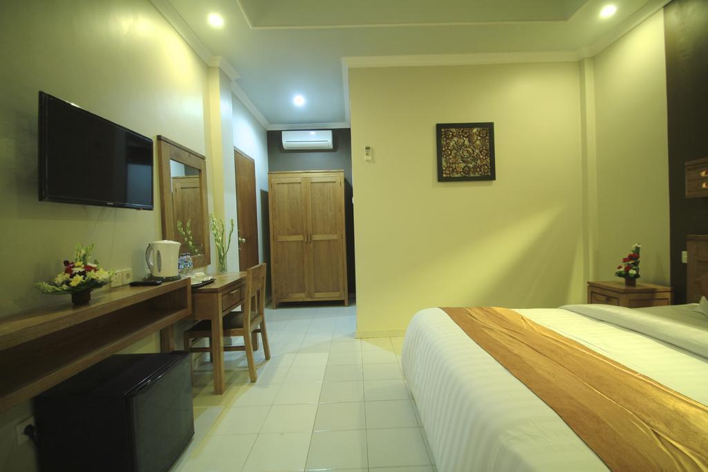 Bakung Sari Resort And Spa Кута Номер фото